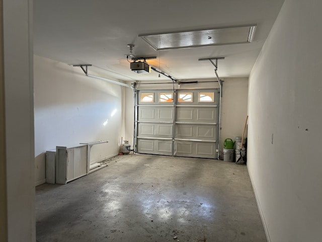 garage featuring a garage door opener