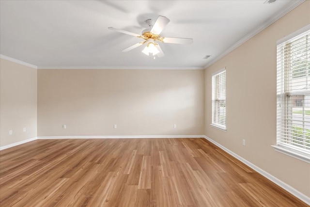 105 Middleton Ct, Tullahoma, TN 37388 - spare room with baseboards, ornamental molding, light wood finished floors, and a wealth of natural light