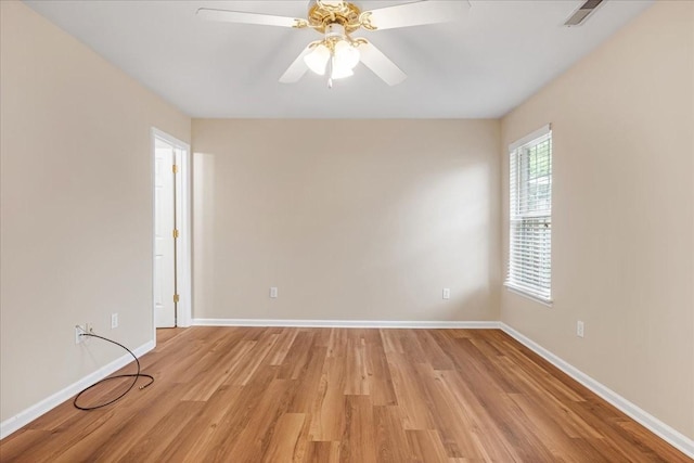 105 Middleton Ct, Tullahoma, TN 37388 - spare room with baseboards, a ceiling fan, and light wood-type flooring