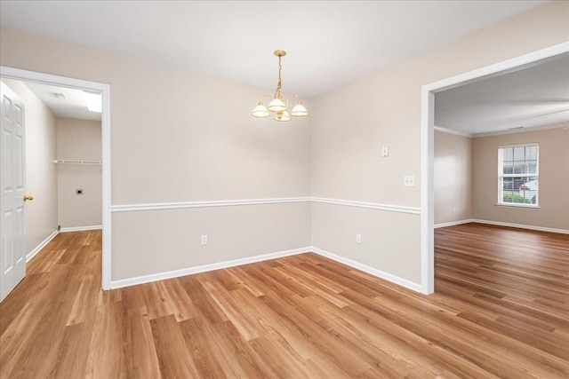 105 Middleton Ct, Tullahoma, TN 37388 - unfurnished dining area featuring baseboards, an inviting chandelier, and light wood-style flooring