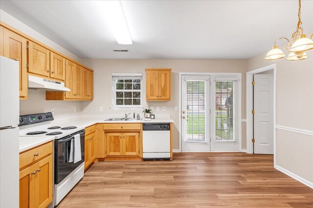 105 Middleton Ct, Tullahoma, TN 37388 - kitchen with visible vents, white appliances, light countertops, under cabinet range hood, and a notable chandelier