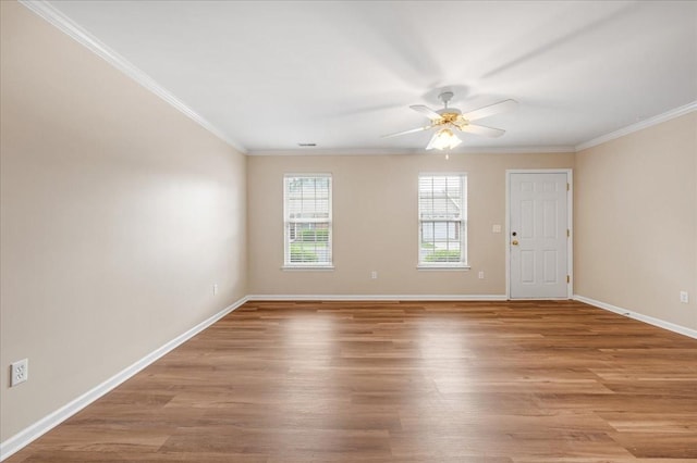 105 Middleton Ct, Tullahoma, TN 37388 - spare room with ceiling fan, ornamental molding, baseboards, and light wood-style flooring