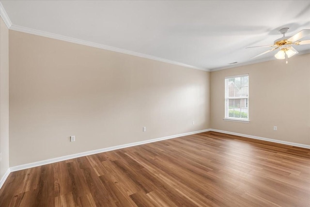 105 Middleton Ct, Tullahoma, TN 37388 - spare room with crown molding, a ceiling fan, baseboards, and wood finished floors