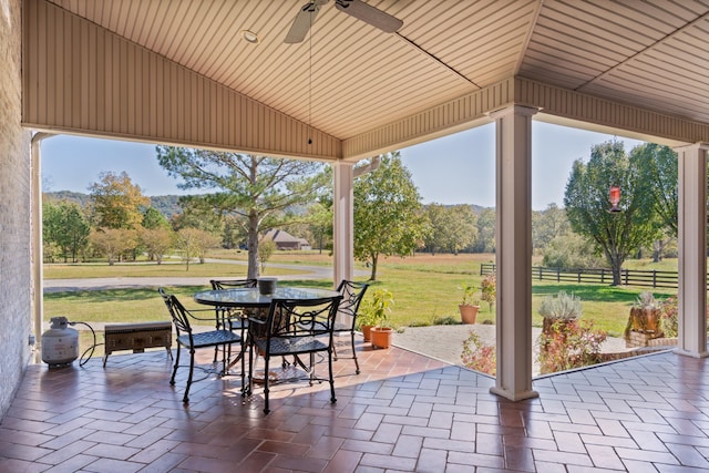 view of patio featuring ceiling fan