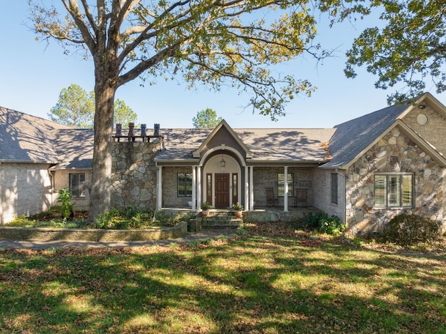 view of front of home with a front yard