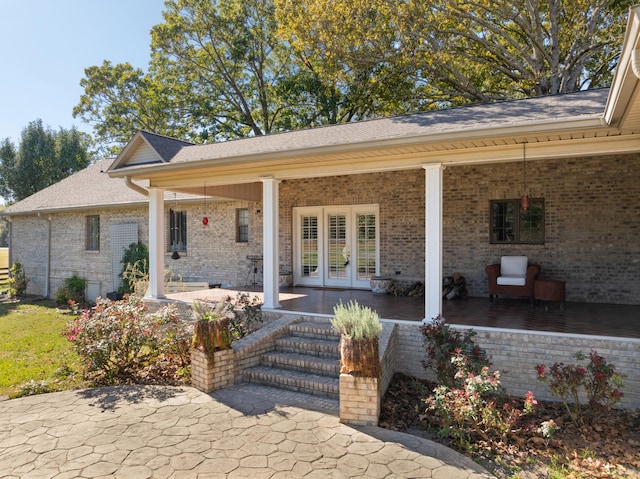 doorway to property with french doors and a patio area