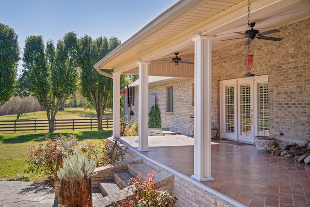 view of patio featuring ceiling fan