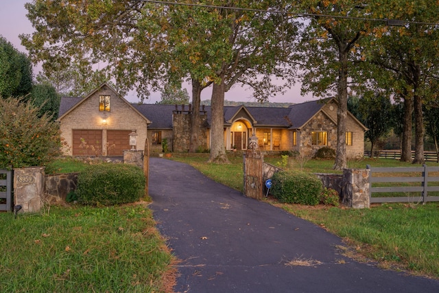 view of front of property with a garage