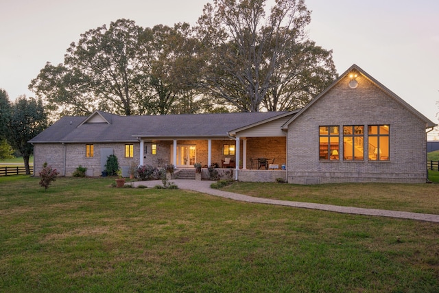 view of front of home with a front lawn