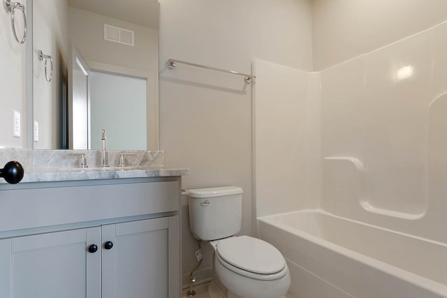 full bathroom with shower / bathing tub combination, vanity, and toilet