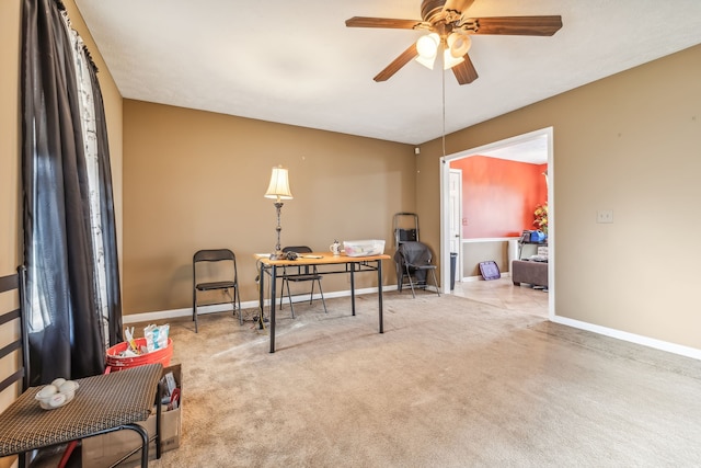 carpeted office with ceiling fan