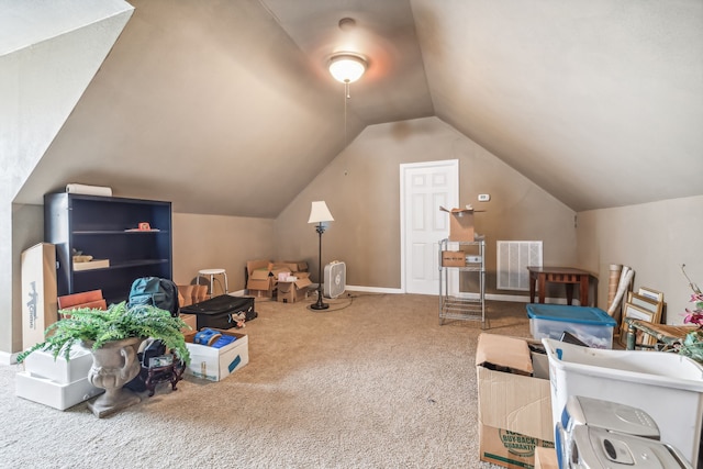 bonus room featuring lofted ceiling and carpet flooring