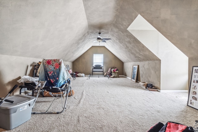 additional living space with lofted ceiling and carpet