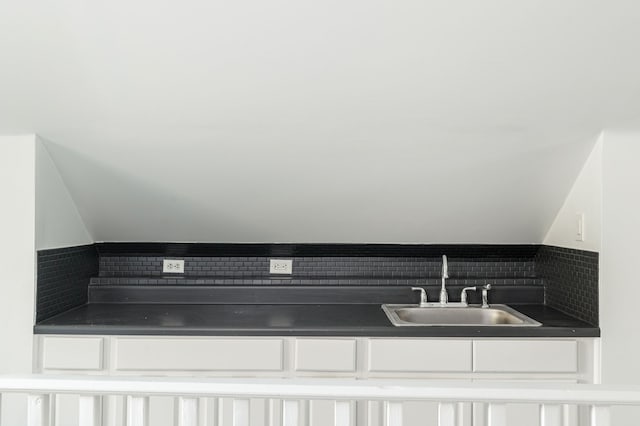 room details with backsplash and sink