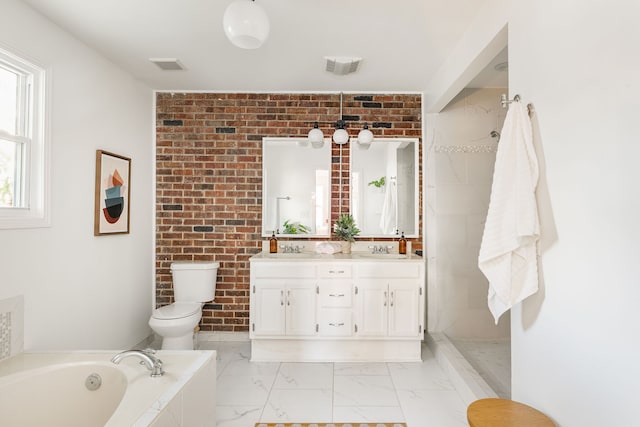 full bathroom featuring vanity, toilet, brick wall, and separate shower and tub