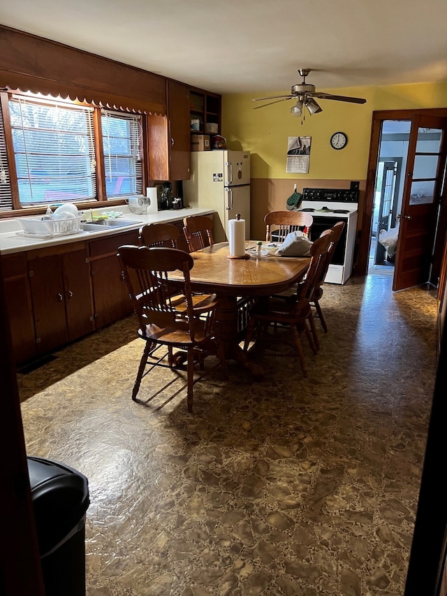 dining area with ceiling fan