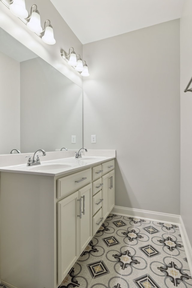 bathroom with vanity and tile patterned flooring