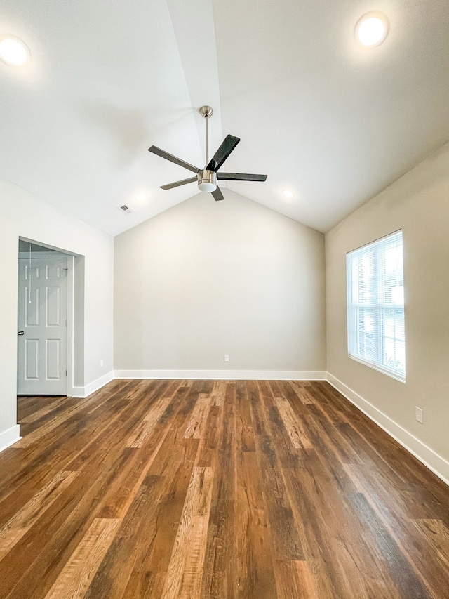 unfurnished room featuring ceiling fan, lofted ceiling, and dark hardwood / wood-style floors