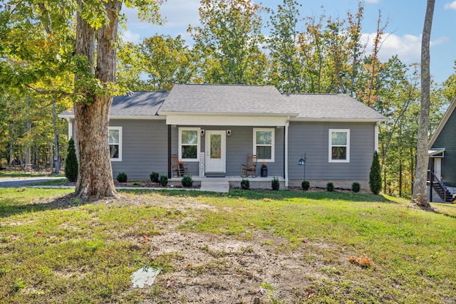 single story home with a porch and a front lawn