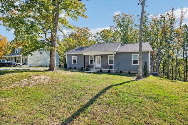 ranch-style home with a front lawn