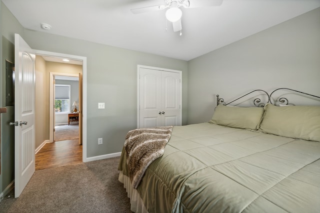 bedroom featuring carpet flooring, a closet, and ceiling fan