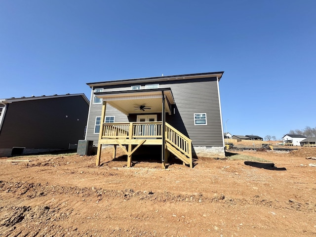 view of front of home with a wooden deck, stairs, central AC, crawl space, and a ceiling fan