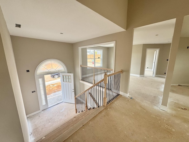 foyer featuring visible vents and baseboards