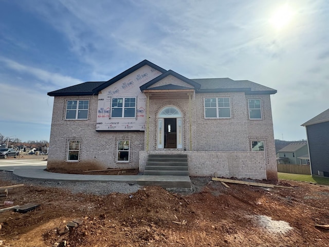 view of front of property featuring brick siding