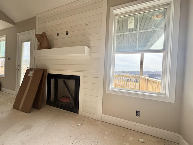 room details with a fireplace and baseboards