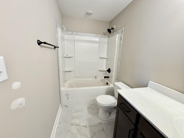 full bathroom featuring vanity, bathtub / shower combination, and toilet