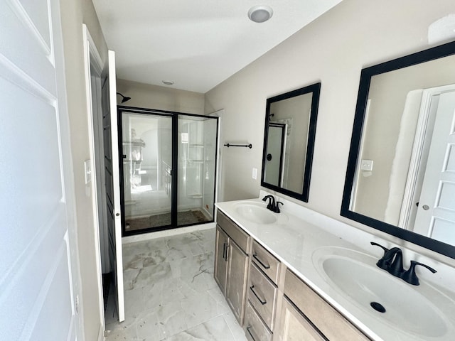 bathroom with vanity and an enclosed shower