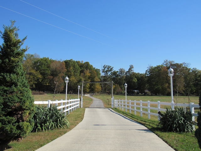 view of property's community featuring a yard