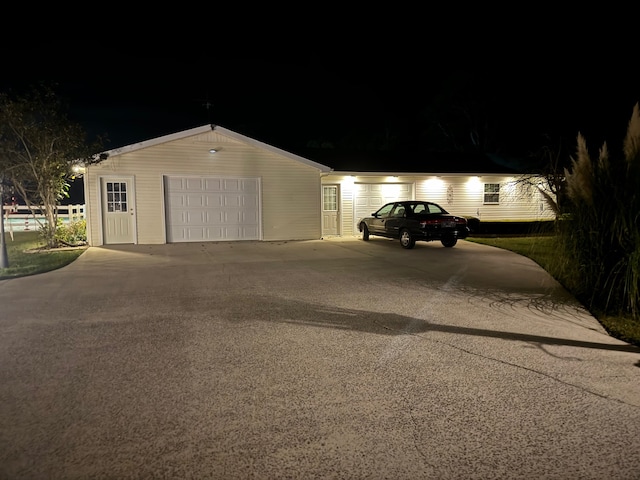 view of garage at night