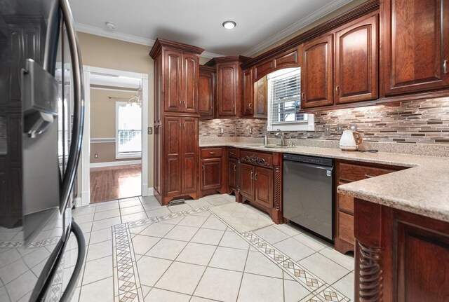 kitchen featuring light tile patterned floors, crown molding, dishwasher, and fridge