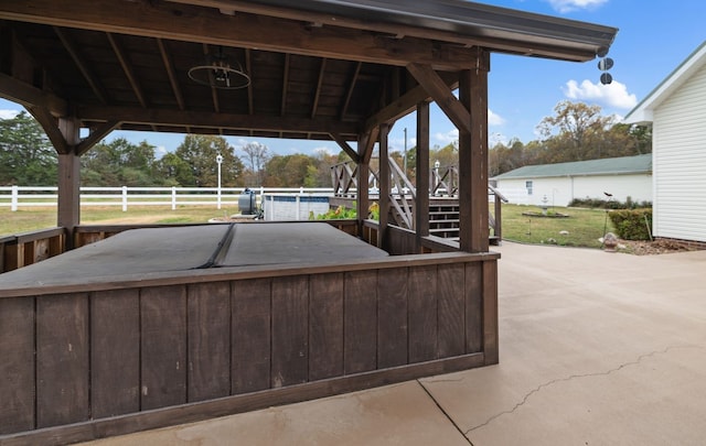 view of patio / terrace featuring a swimming pool