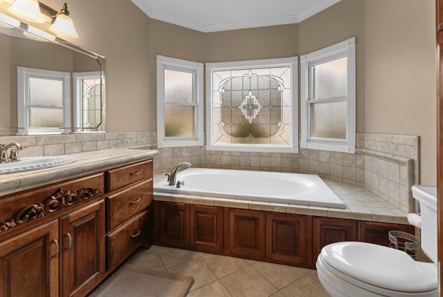 bathroom featuring toilet, a tub to relax in, tile patterned flooring, crown molding, and vanity