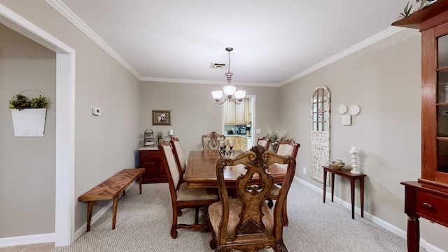 carpeted dining area with a notable chandelier and ornamental molding