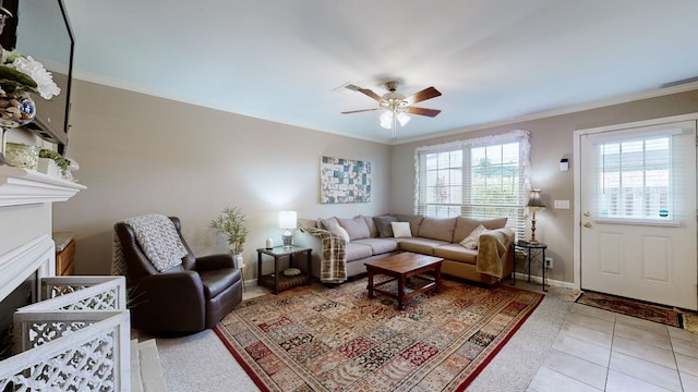 tiled living room with crown molding and ceiling fan