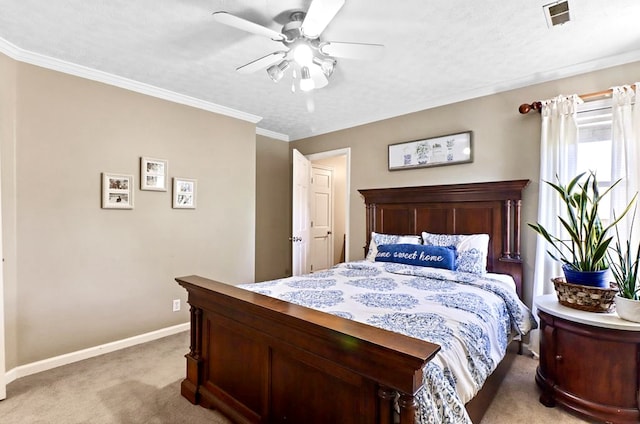 carpeted bedroom featuring crown molding, a textured ceiling, and ceiling fan