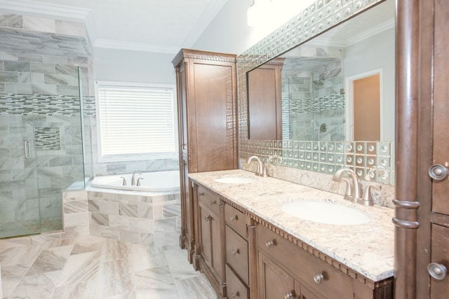 bathroom with vanity, ornamental molding, and shower with separate bathtub