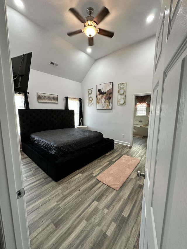 bedroom with lofted ceiling, wood-type flooring, and ceiling fan