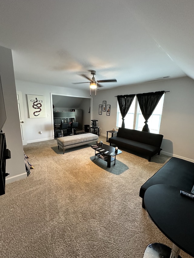 carpeted living room featuring ceiling fan