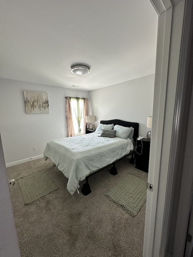 bedroom featuring carpet flooring