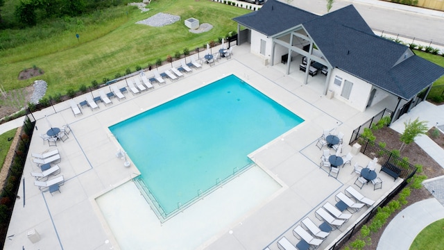 view of swimming pool featuring a patio area