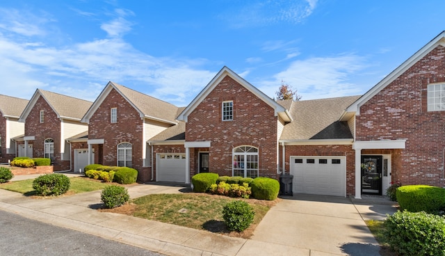 front facade with a garage