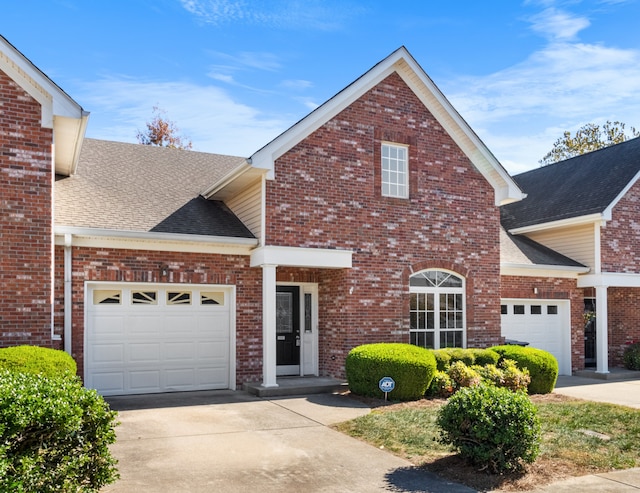 front facade with a garage