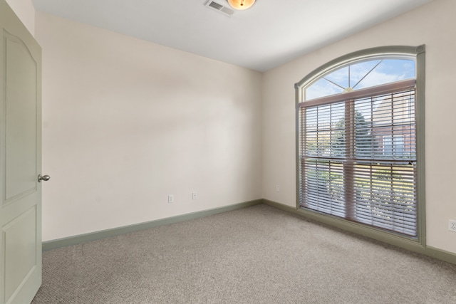 view of carpeted spare room