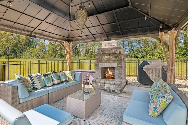 2971 Spanntown Rd, Arrington, TN 37014 - view of patio featuring a gazebo, an outdoor living space with a fireplace, and grilling area