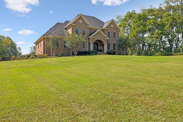 view of front of property with a front lawn