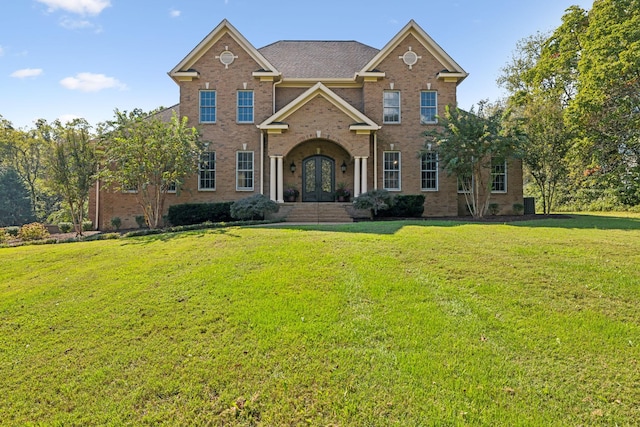 2971 Spanntown Rd, Arrington, TN 37014 - view of front of home with french doors, a front yard, and brick siding